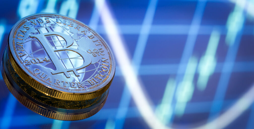 Bitcoin, a new concept of virtual money, graphics and digital background. Gold coin with the image of the letter B