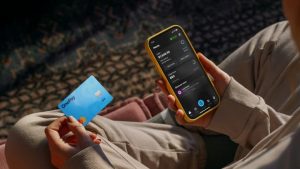 108193606-1756898318402-phone-in-hand-wth-one-card